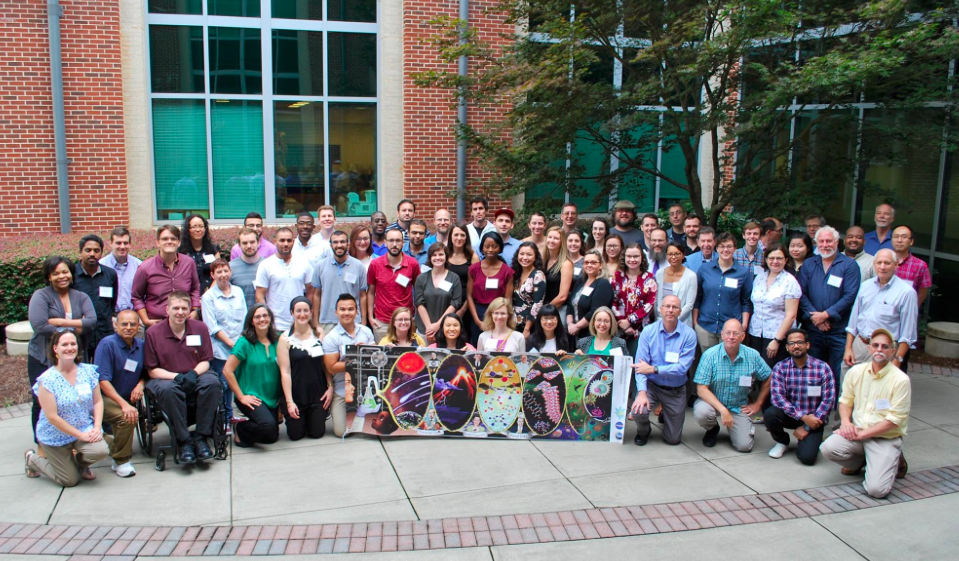 Center for Chemical Evolution staff with mural (2018 pic by Georgia Tech)