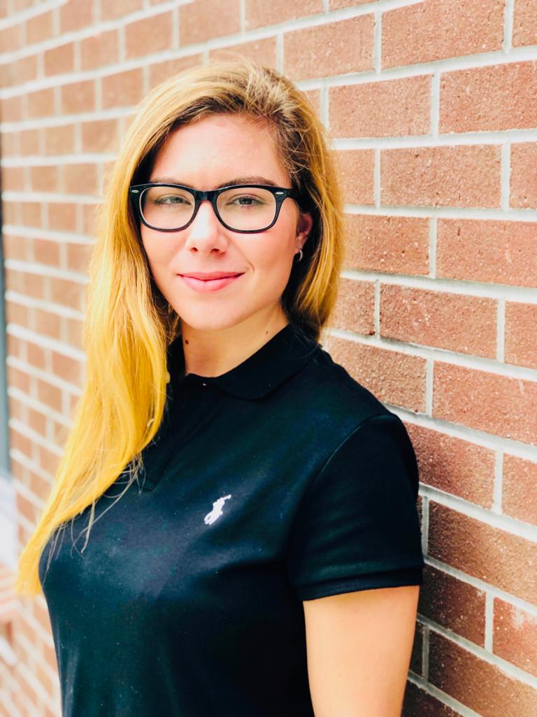 Courtney Astore is balancing teaching, classes, and research this summer.