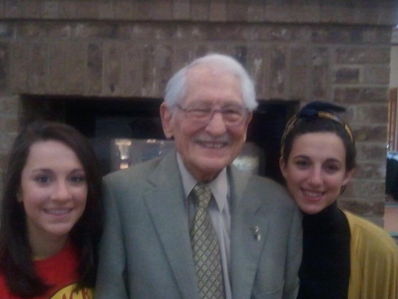 Jess Eskew (left) credits her grandfather, Bob Eskew (center) for inspiring her love for Georgia Tech.