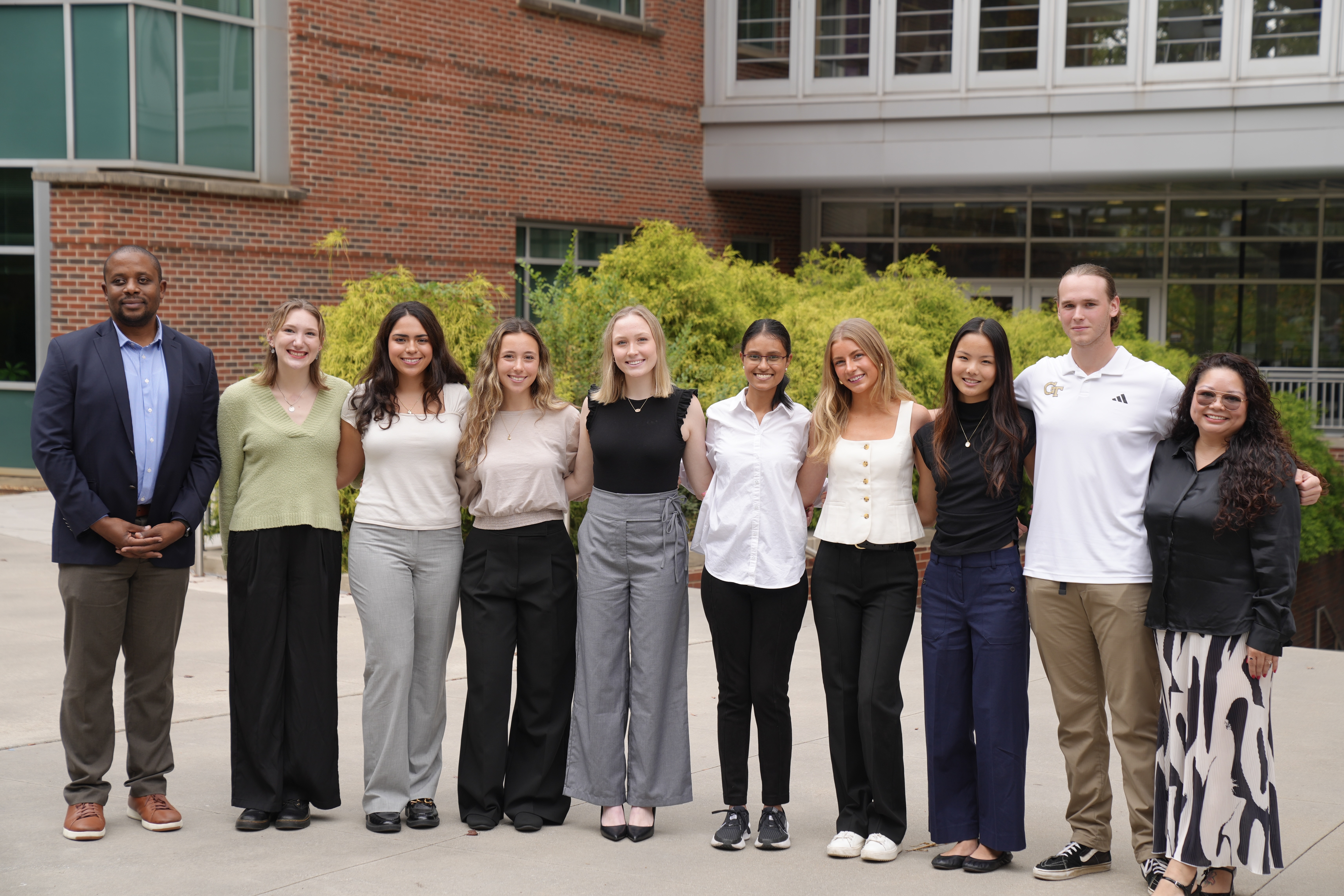 C-PIES Director Lewis Wheaton (far left) and College of Sciences Program Director Lea Marzo (far right) pose with STEP students after a presentation to the College of Sciences Advisory Board.