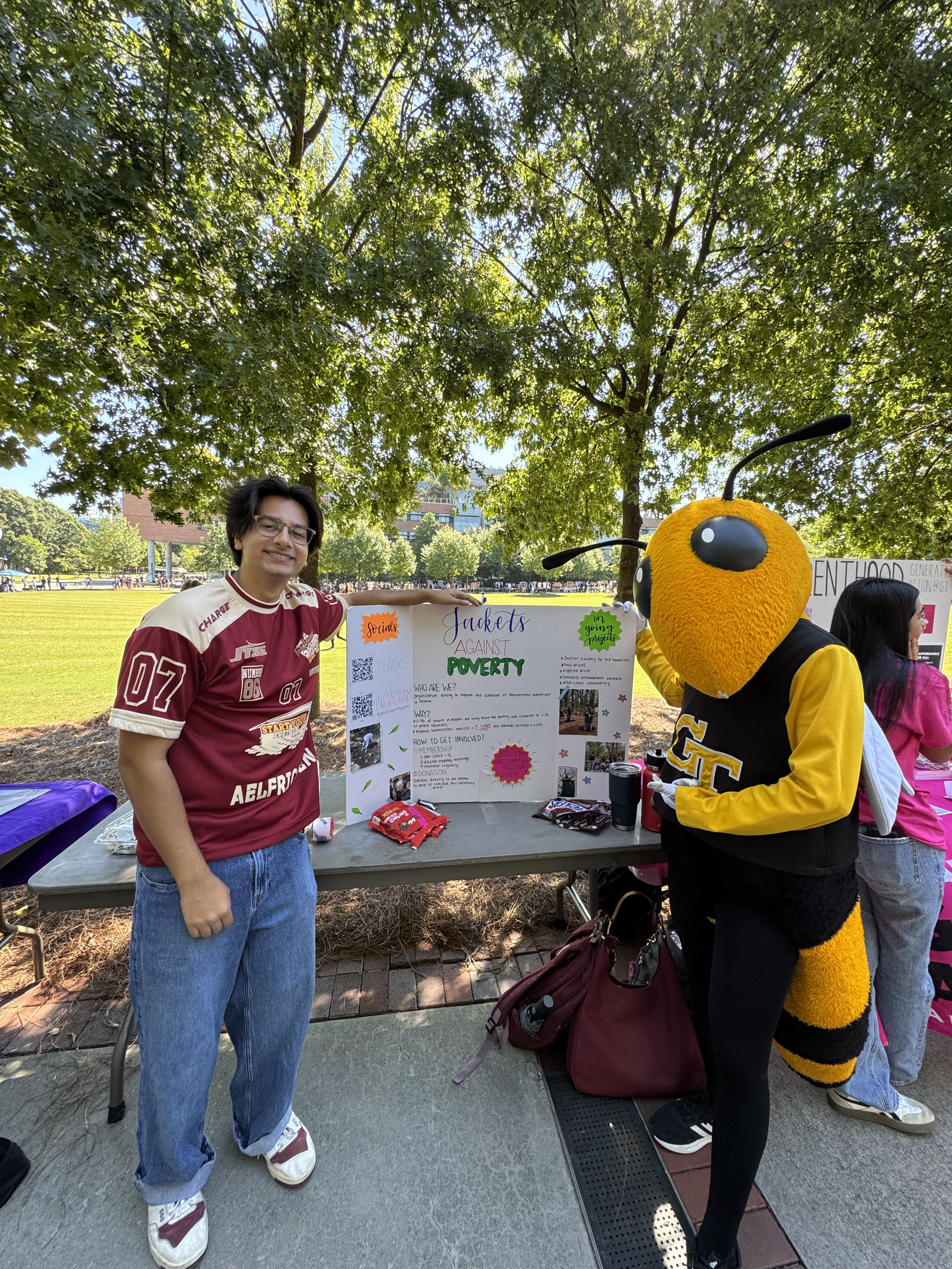 Yellow Jackets Against Poverty Vice President Deven Shah and Buzz recruit new members for the organization.