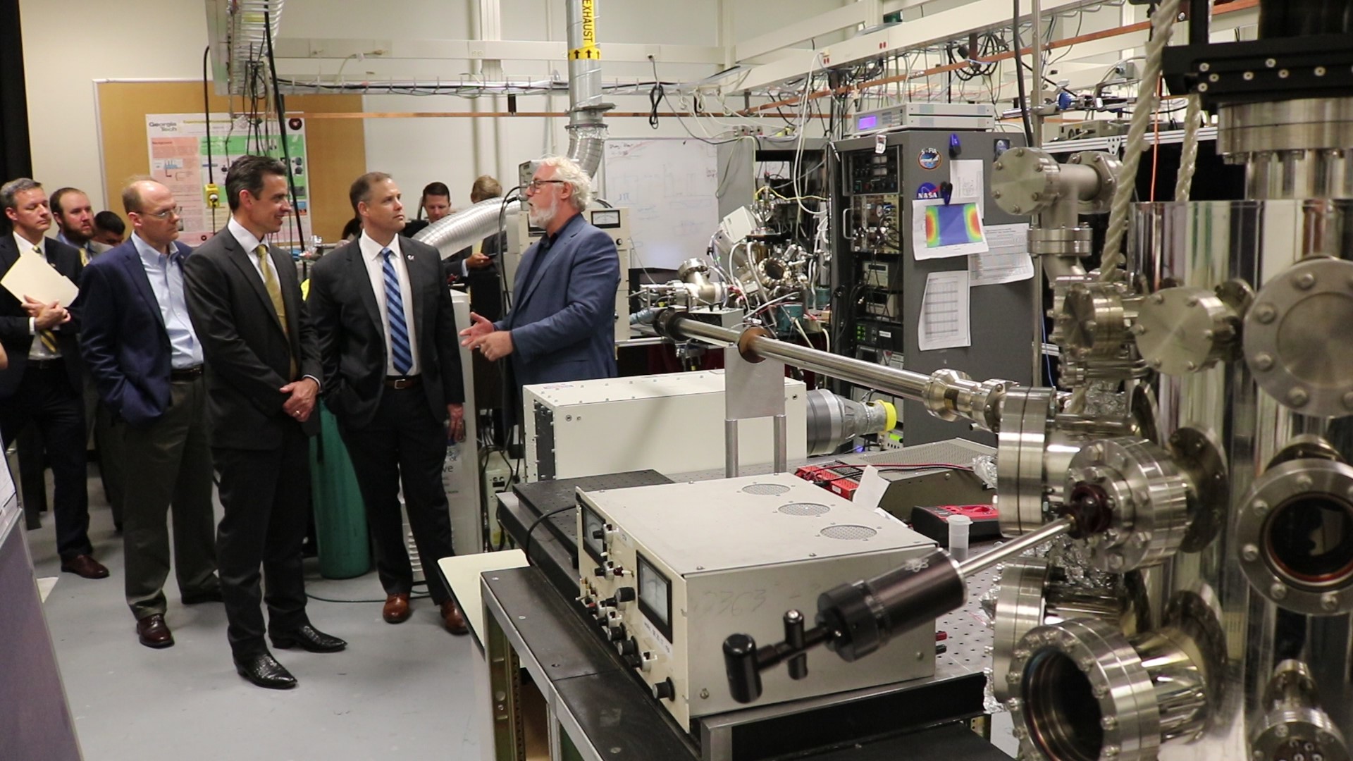 A NASA delegation led by Administrator Jim Bridenstine visited Thom Orlando’s REVEALS research lab July 31, 2019. (Photo by Renay San Miguel)