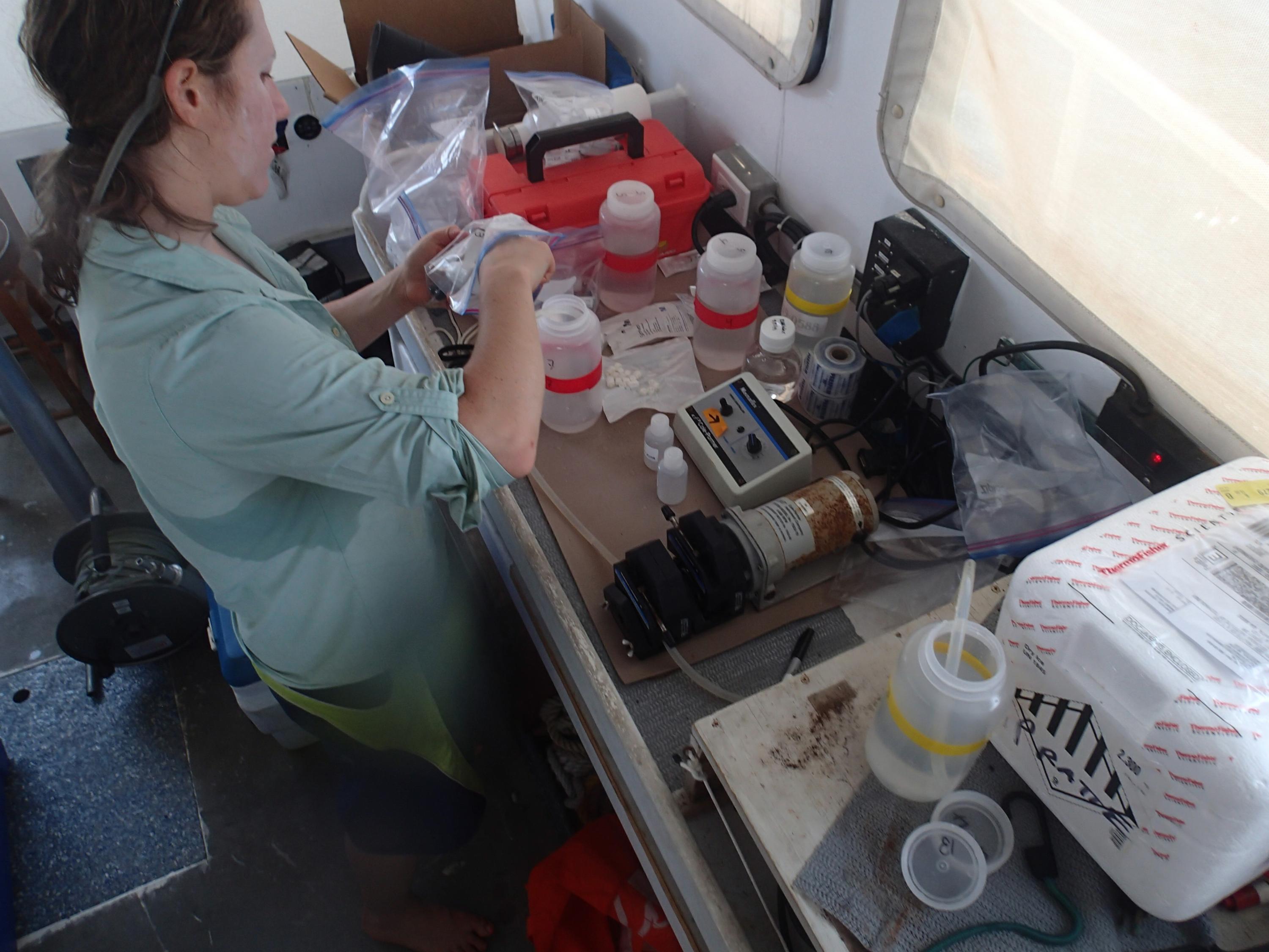 Nastassia Patin studies samples taken from underwater sinkholes known as blue holes. 
