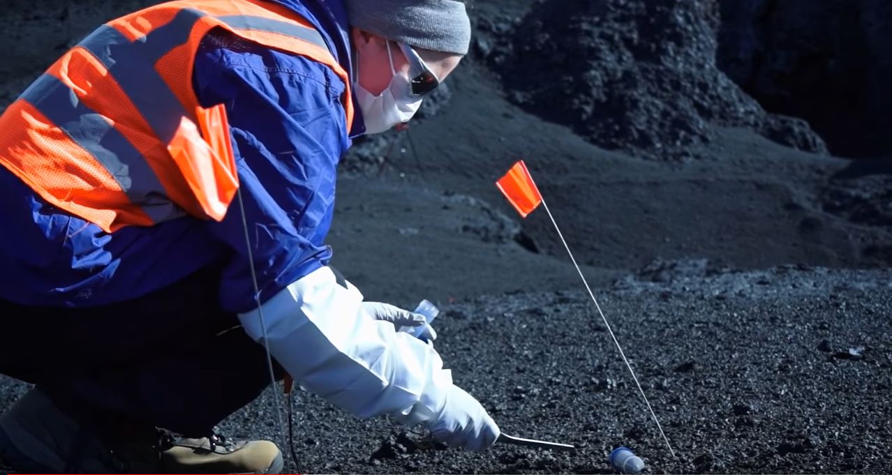 Researcher takes samples at NASA's Iceland FELDSPAR site (Photo NASA)