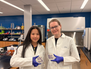 Grace Tang (Left) and Alison Onstine (Right) holding bacteria plates that spell "BIOL 4590" (Credit: Tang and Onstine) Grace Tang (Left) and Alison Onstine (Right) holding bacteria plates that spell "BIOL 4590" (Credit: Tang and Onstine)